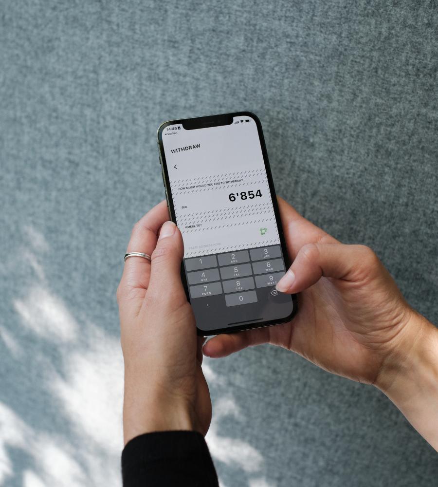Startfeld Wallet app inside a smartphone created by blokk studio